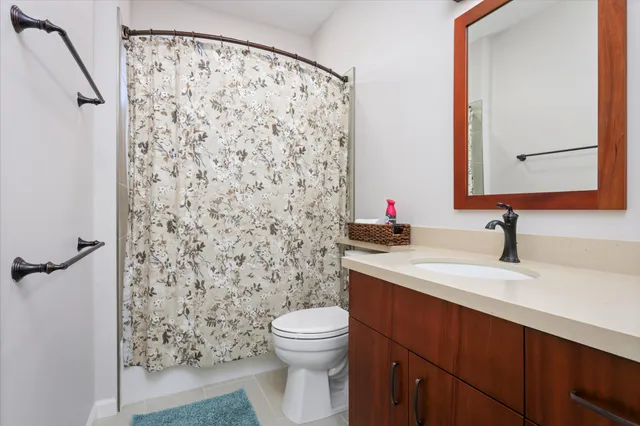 a view of a balcony dining table and chairs