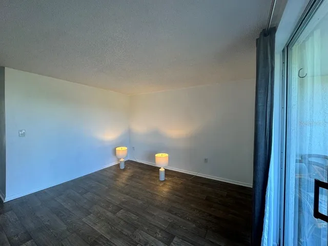 a view of empty room with stairs