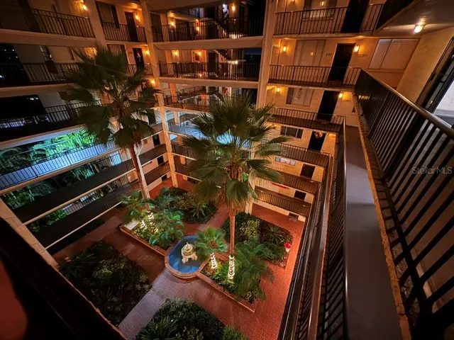 a view of a balcony with an outdoor space