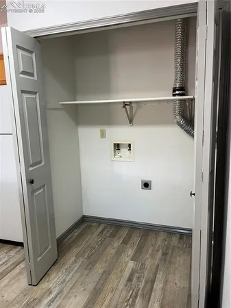 a view of a refrigerator in kitchen