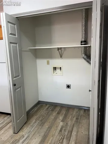 a view of a refrigerator in kitchen
