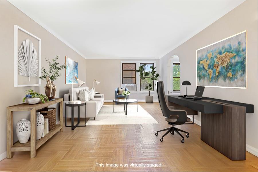 657 East 26th Street, Unit 4K Brooklyn, NY 11210 - Photo 2 of 6 a view of a livingroom with workspace and a couch