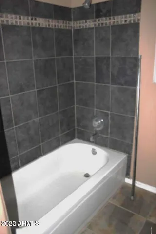 a bathroom with a bathtub