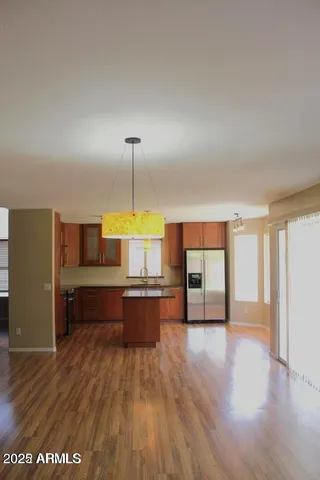 a open kitchen with a table and a stove