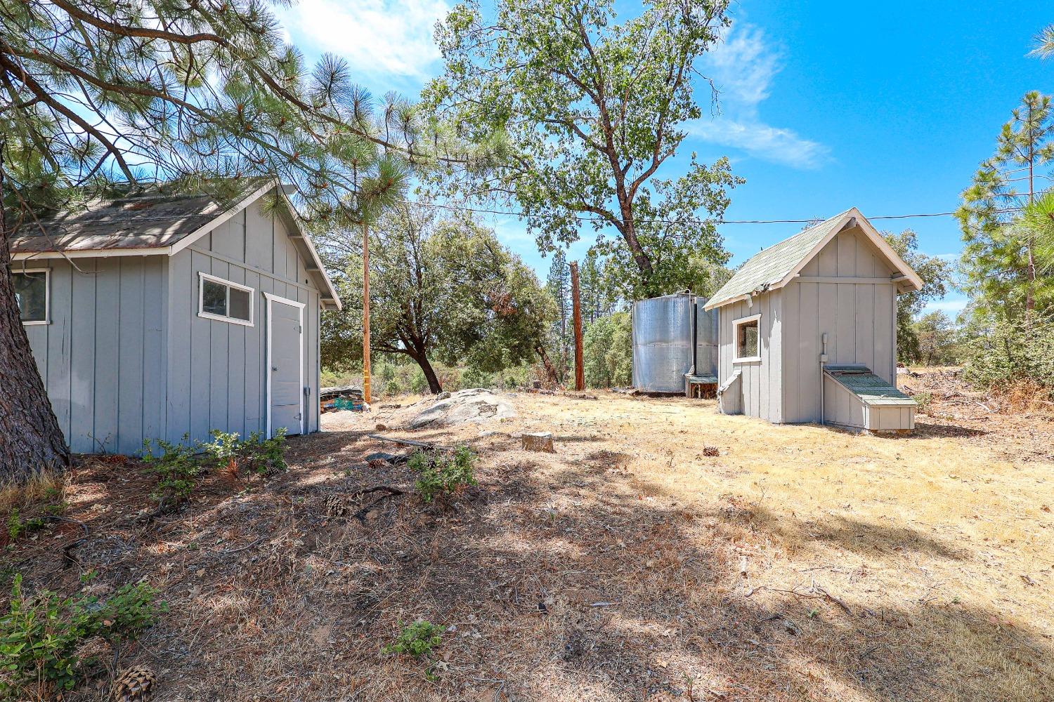 5240 Tiptop Road Mariposa, CA 95338 - Photo 60 of 71 a view of a house with a yard covered in snow