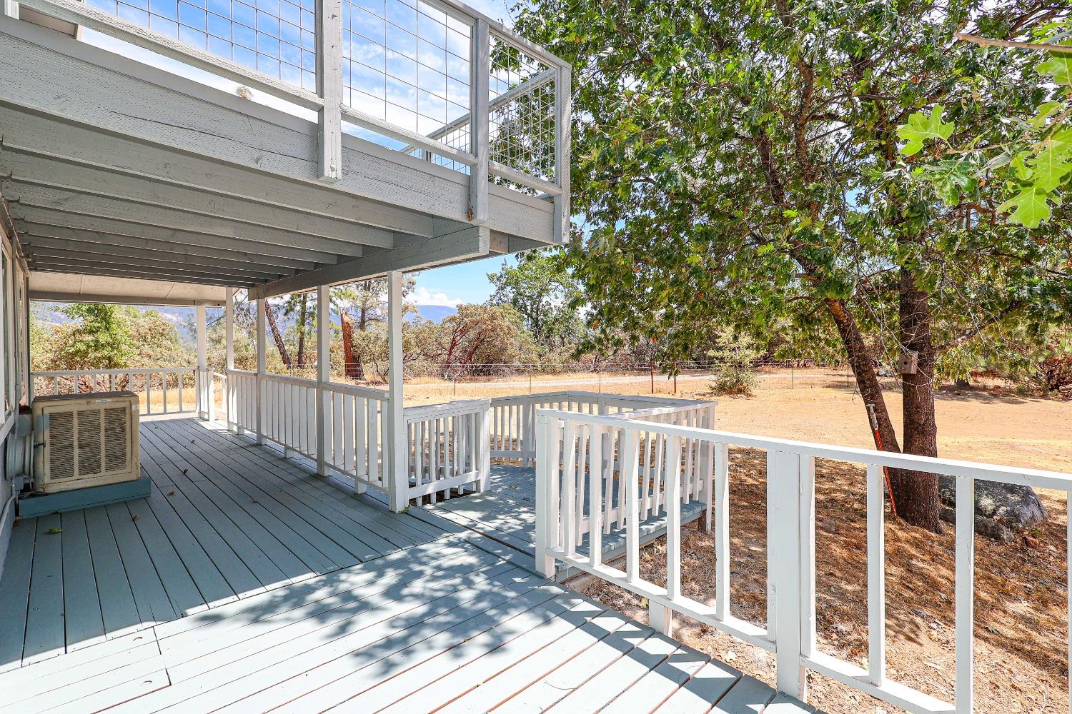 5240 Tiptop Road Mariposa, CA 95338 - Photo 10 of 71 a view of a wooden deck