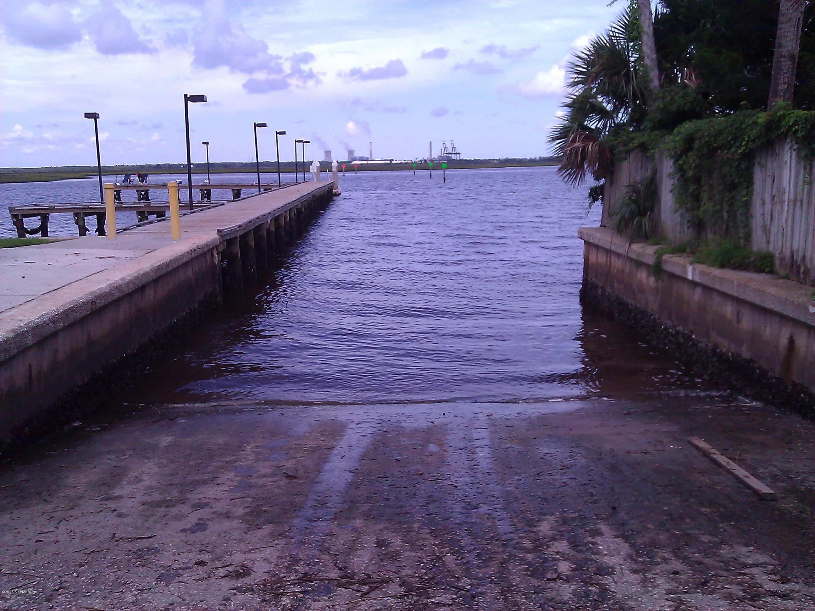 6717 West Fincannon Road Jacksonville, FL 32277 - Photo 30 of 32 a view of a pathway with a wrought fence