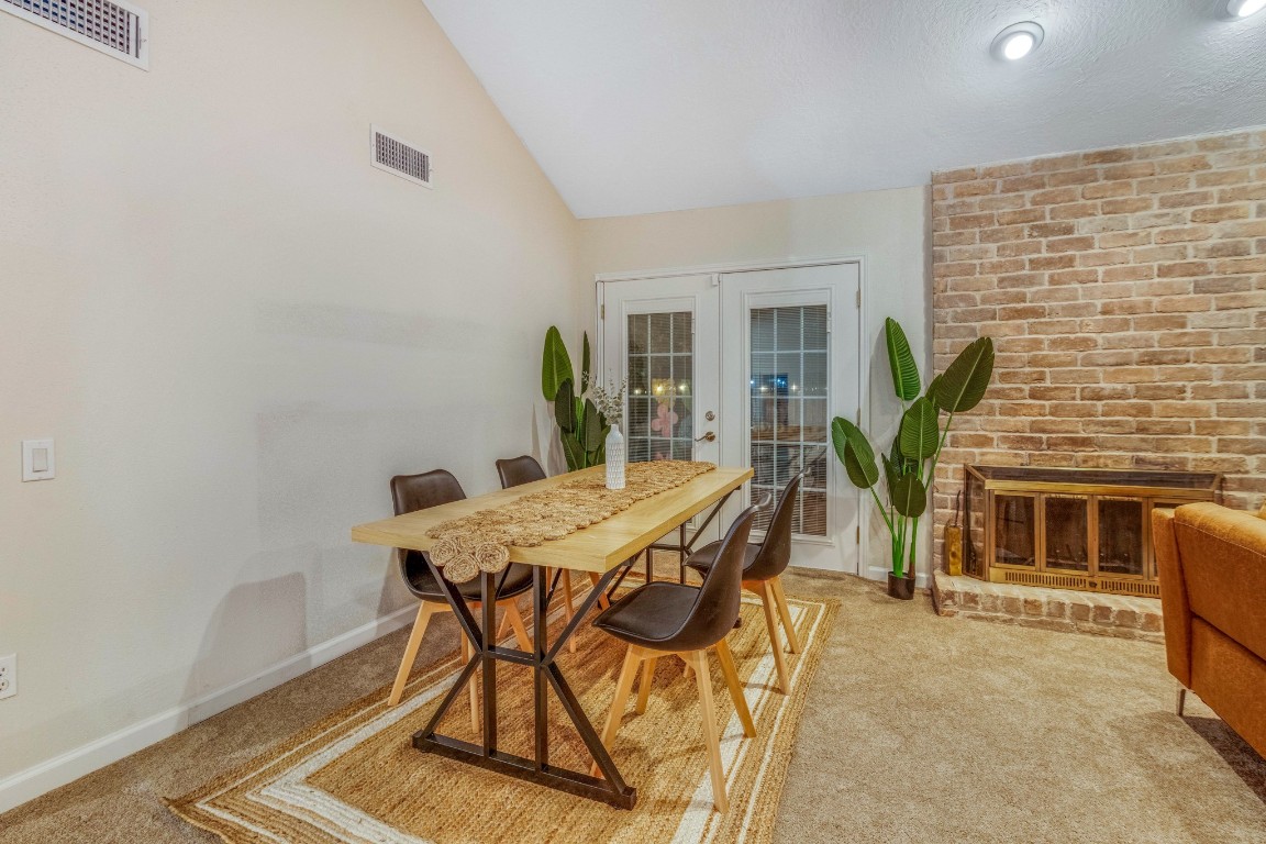 2539 Jester Lane Stafford, TX 77477 - Photo 5 of 16 a view of a dining room with furniture and a potted plant