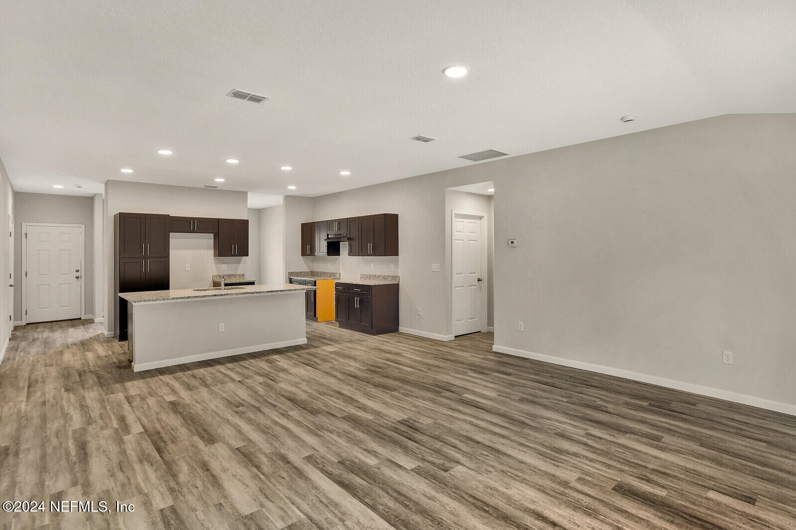 7267 Honda Drive Jacksonville, FL 32222 - Photo 8 of 26 Kitchen Overlooking Living Area