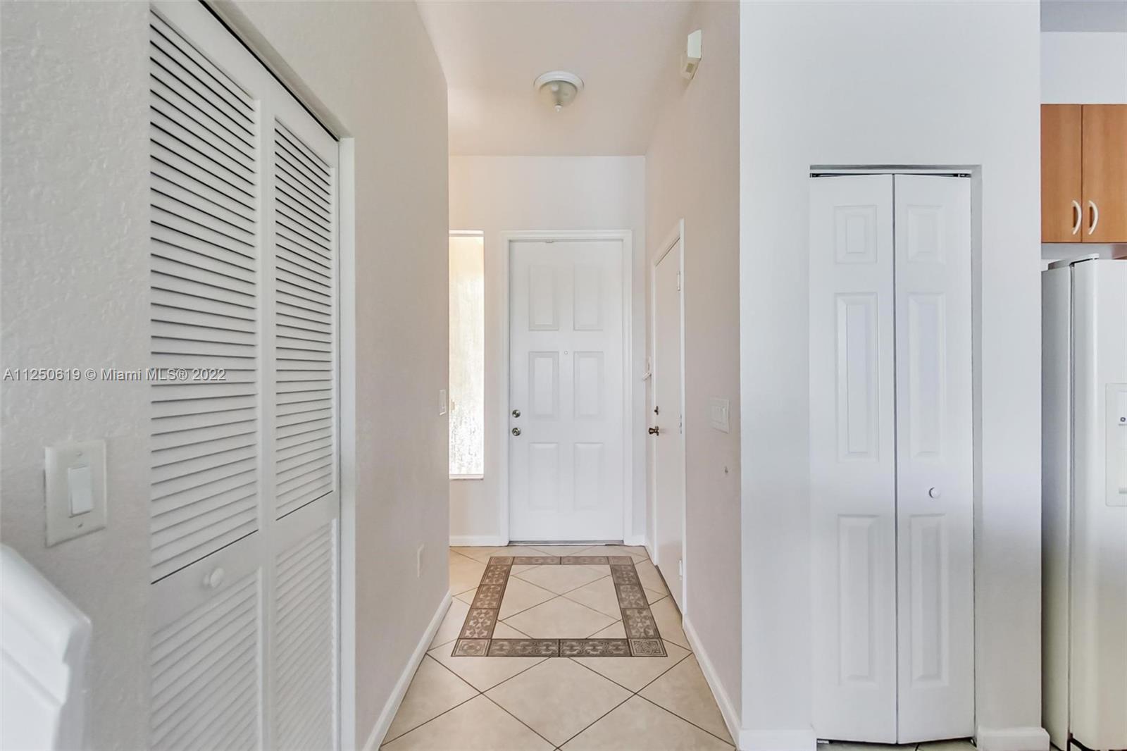 Silver Falls Miramar, FL 33027 - Photo 4 of 38 a view of a bathroom from the hallway