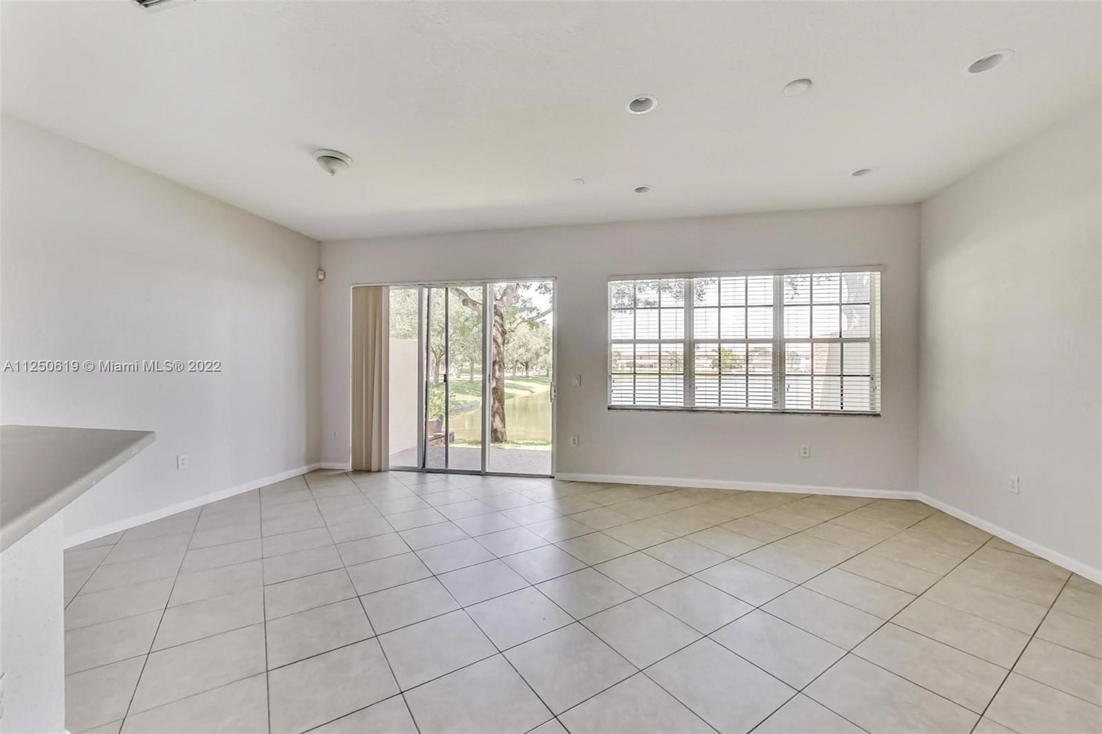 Silver Falls Miramar, FL 33027 - Photo 6 of 38 a view of an empty room with a window