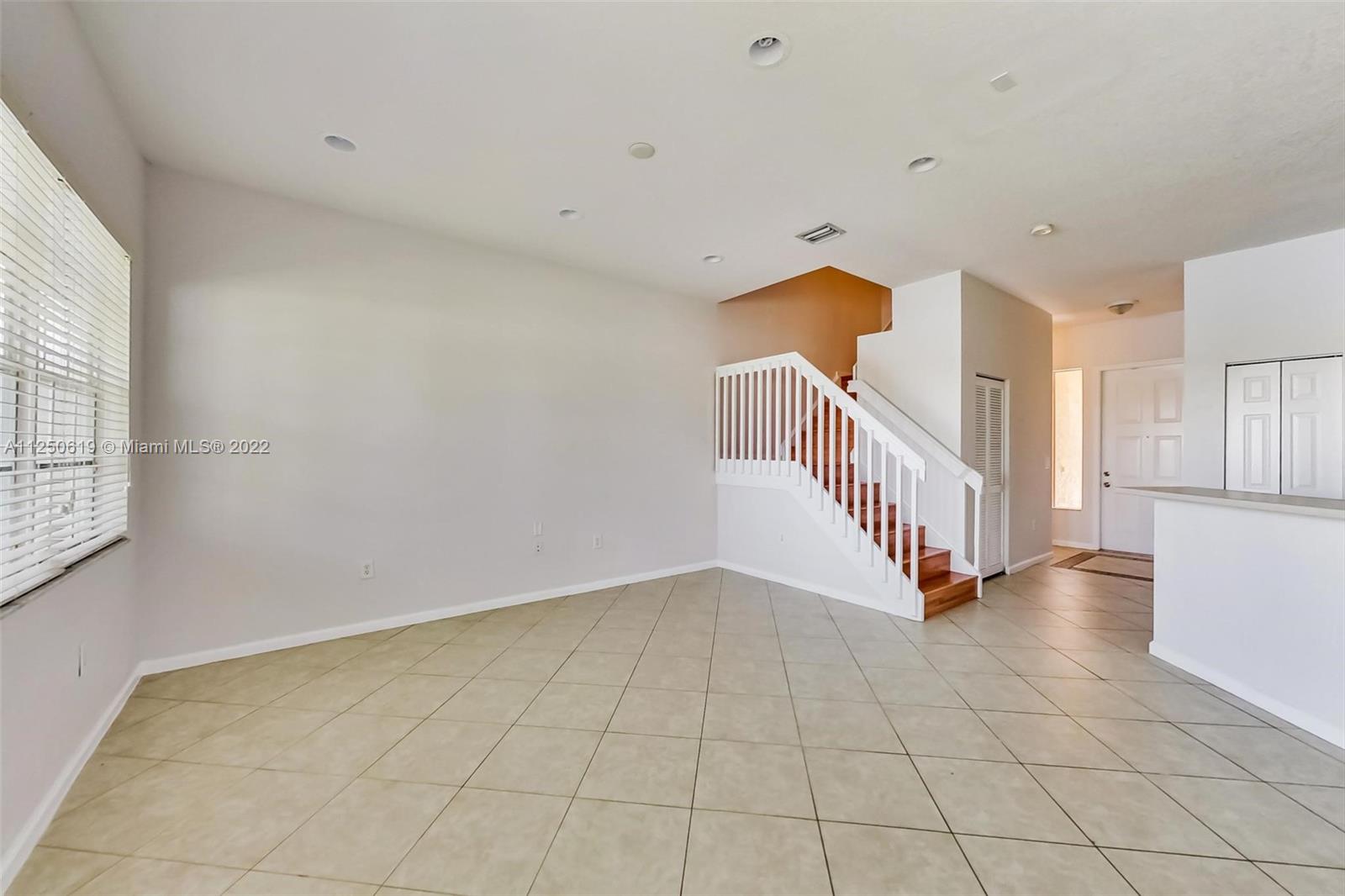Silver Falls Miramar, FL 33027 - Photo 8 of 38 a view of an entryway with wooden floor