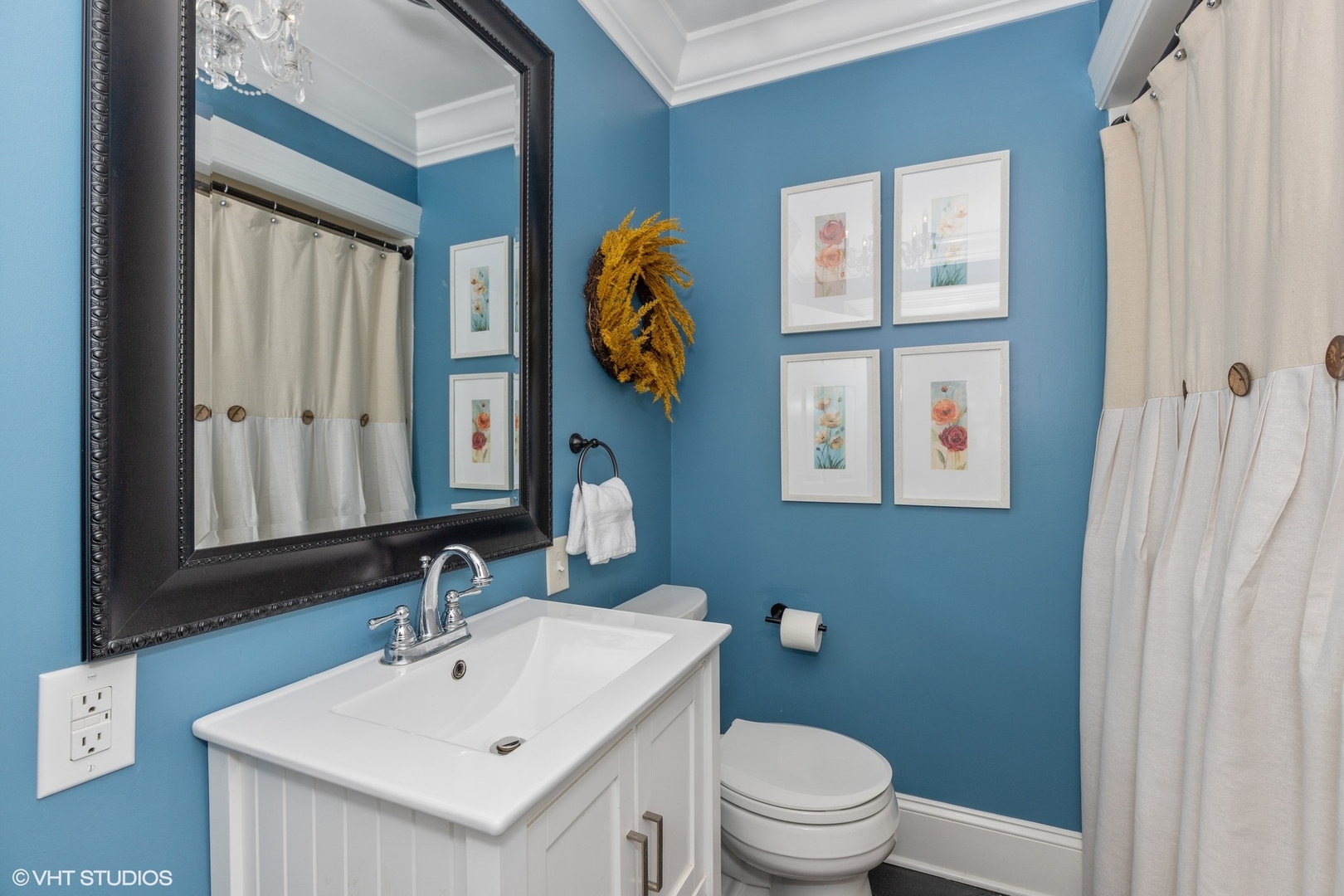 1414 North Avenue Bannockburn, IL 60015 - Photo 18 of 29 a bathroom with a sink a toilet and a mirror