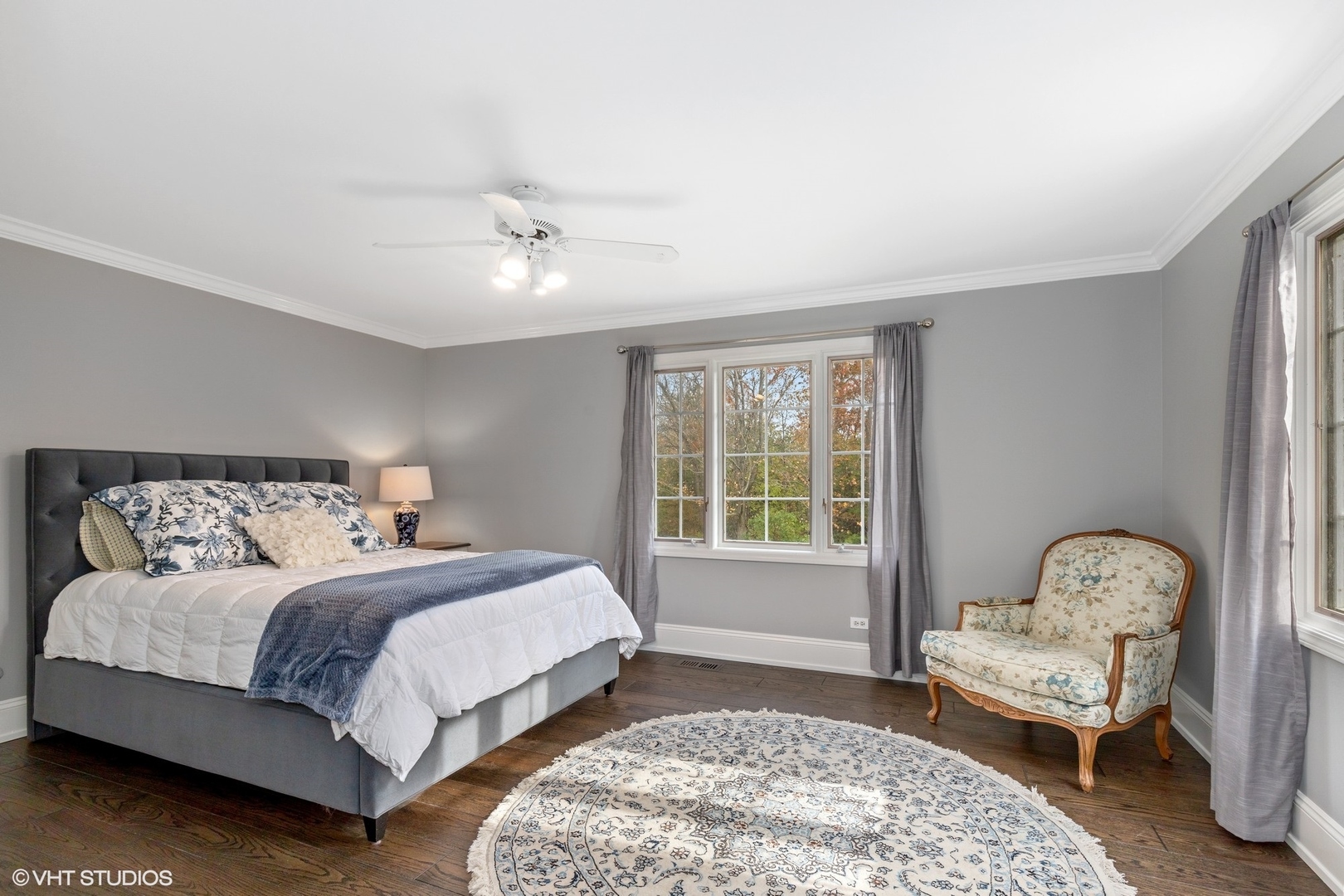 1414 North Avenue Bannockburn, IL 60015 - Photo 21 of 29 a spacious bedroom with a bed and a window