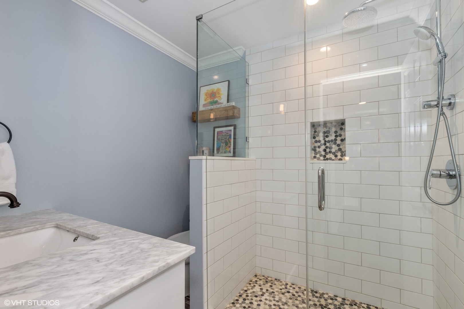 1414 North Avenue Bannockburn, IL 60015 - Photo 23 of 29 a bathroom with a granite countertop shower a sink and a shower