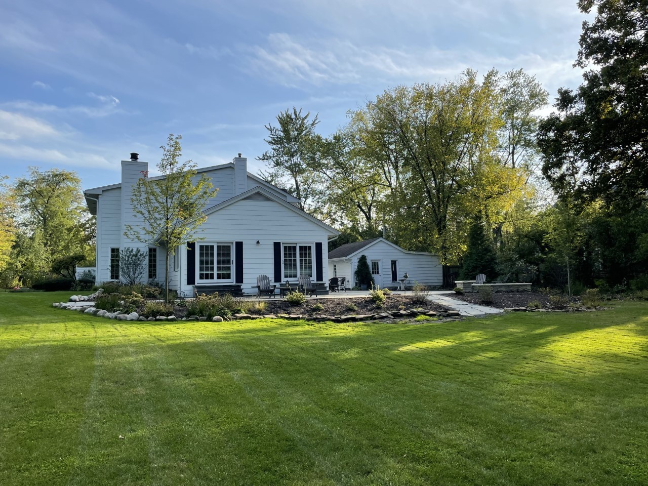 1414 North Avenue Bannockburn, IL 60015 - Photo 29 of 29 a view of a house with a big yard and large trees