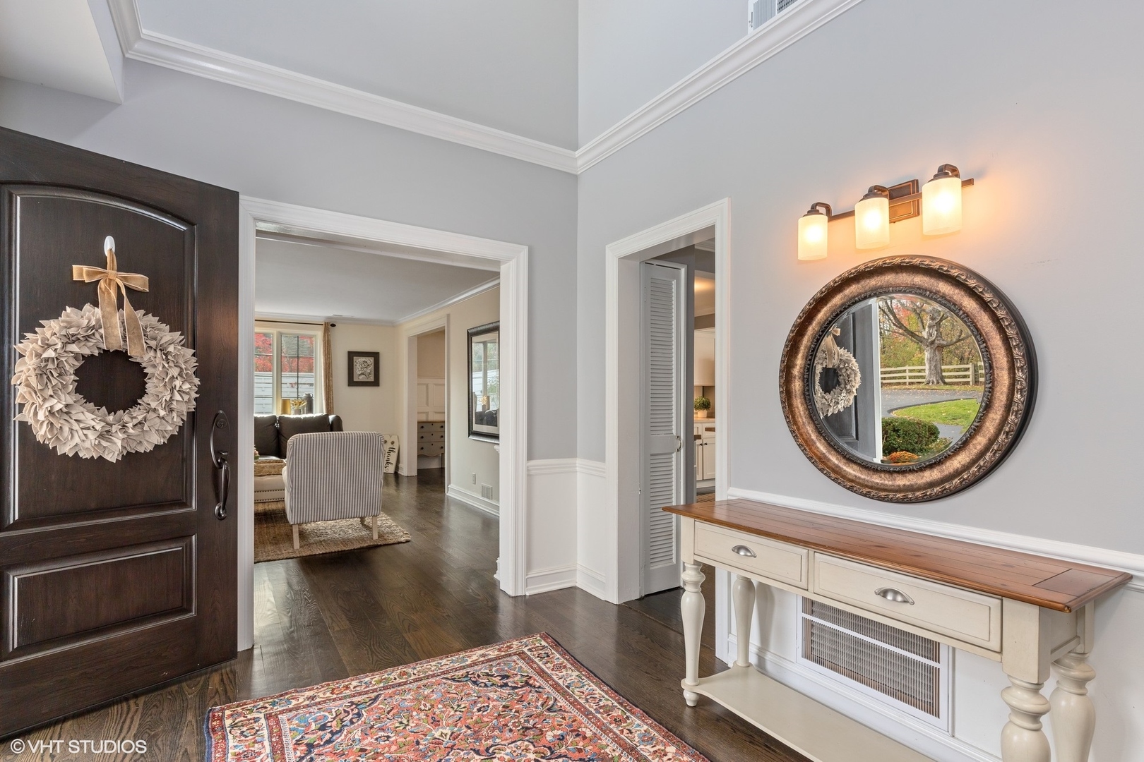 1414 North Avenue Bannockburn, IL 60015 - Photo 5 of 29 a view of a hallway to a livingroom and a stove top oven