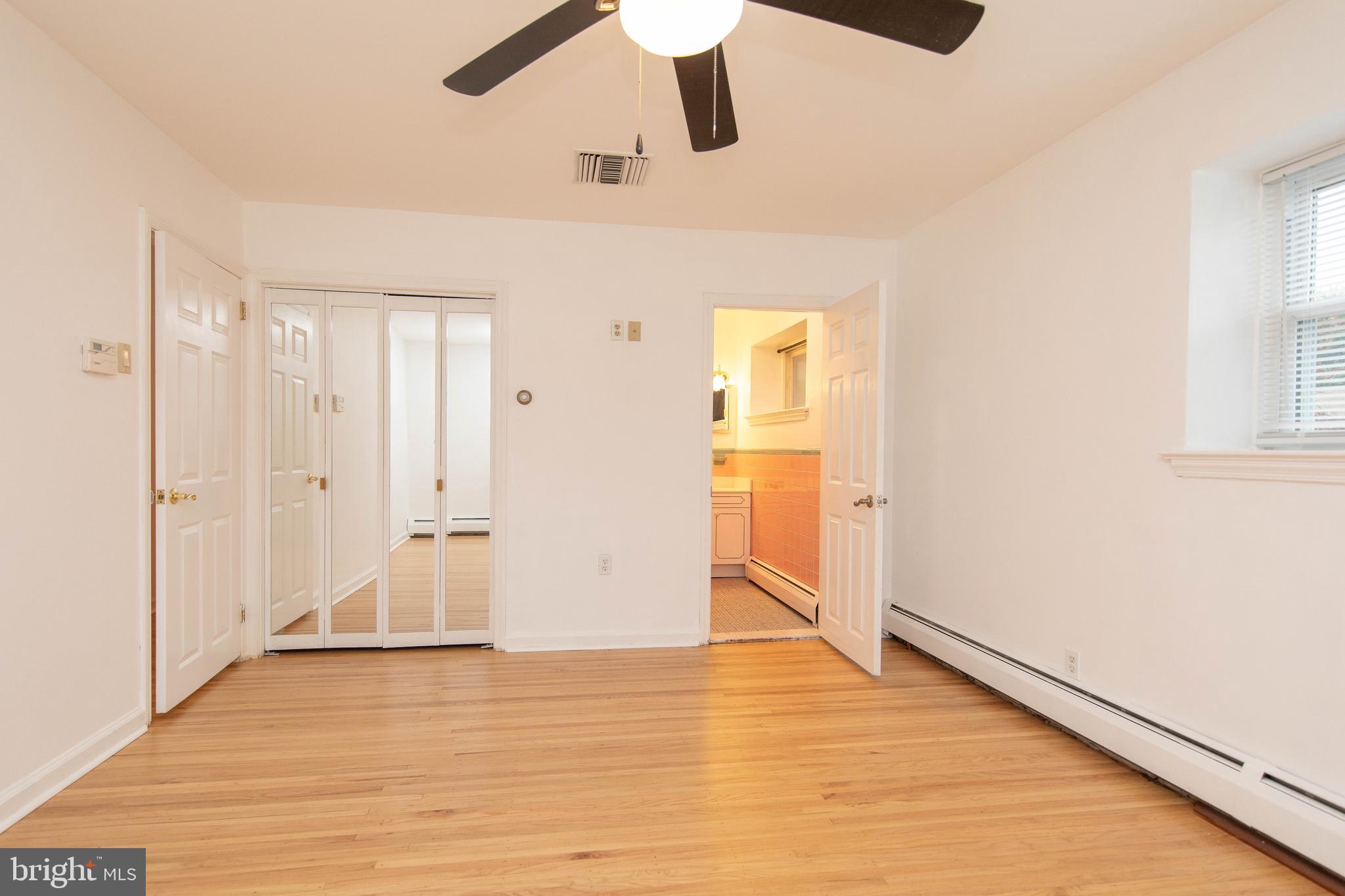 95 Radburn Road Huntingdon Valley, PA 19006 - Photo 17 of 40 a view of an empty room with wooden floor