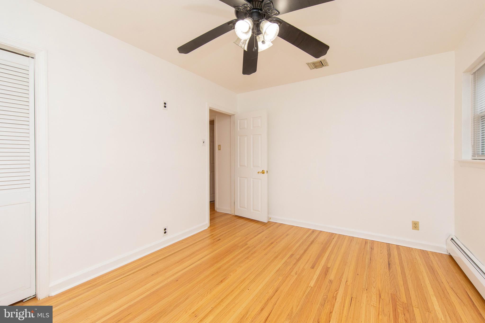 95 Radburn Road Huntingdon Valley, PA 19006 - Photo 26 of 40 a view of empty room with wooden floor