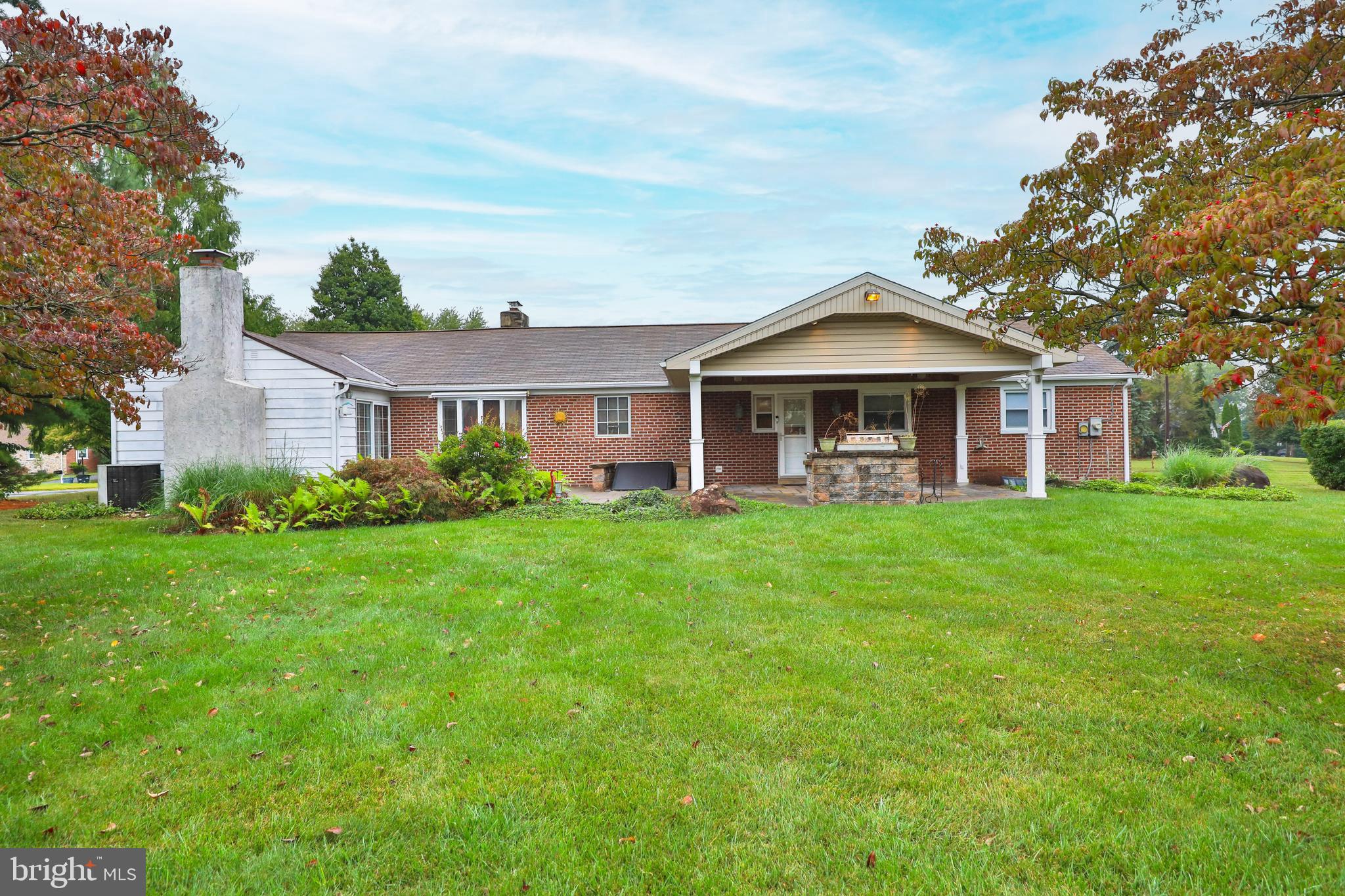95 Radburn Road Huntingdon Valley, PA 19006 - Photo 3 of 40 a front view of a house with a yard