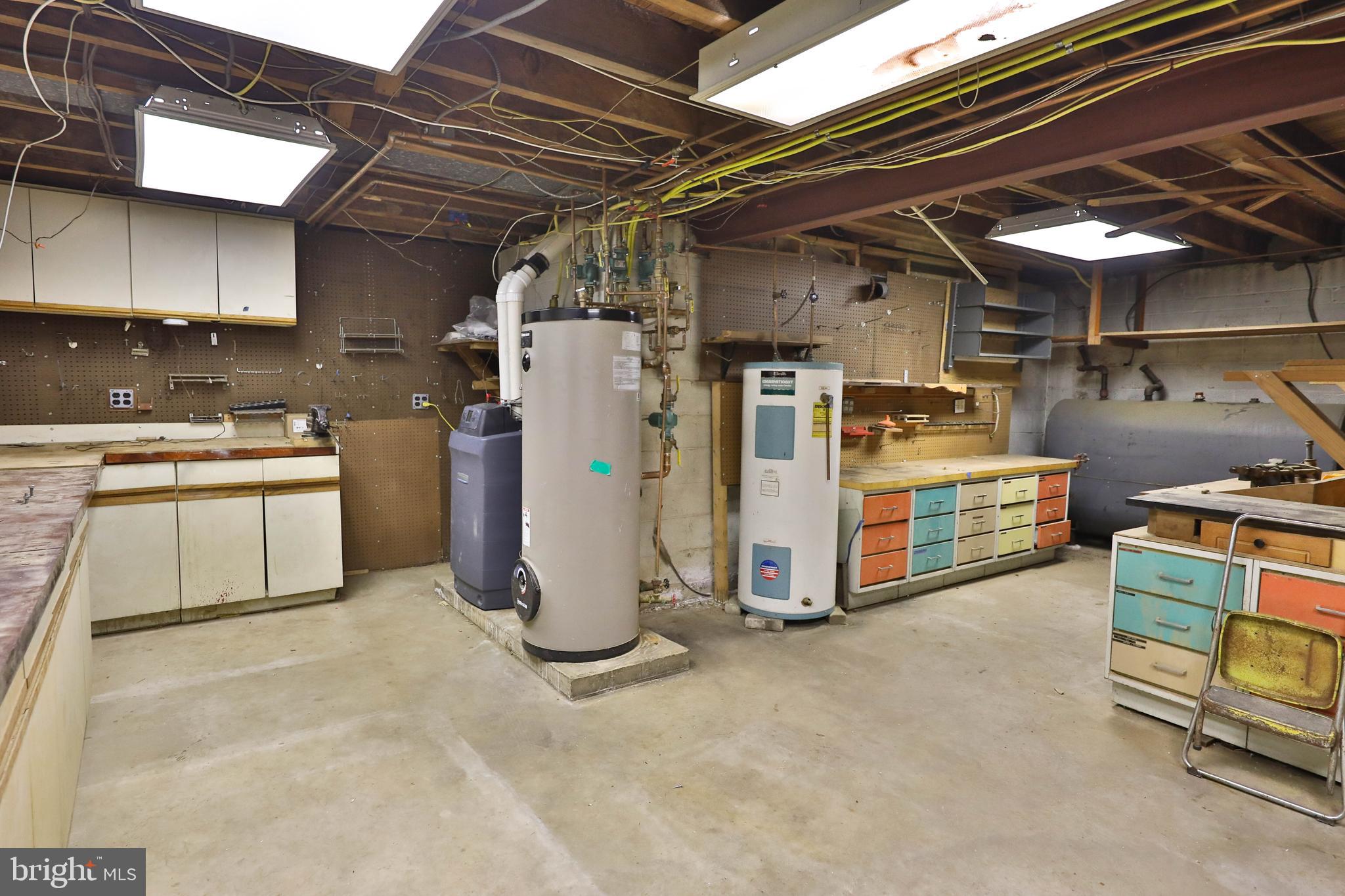 95 Radburn Road Huntingdon Valley, PA 19006 - Photo 32 of 40 a view of a storage & utility room with cabinets