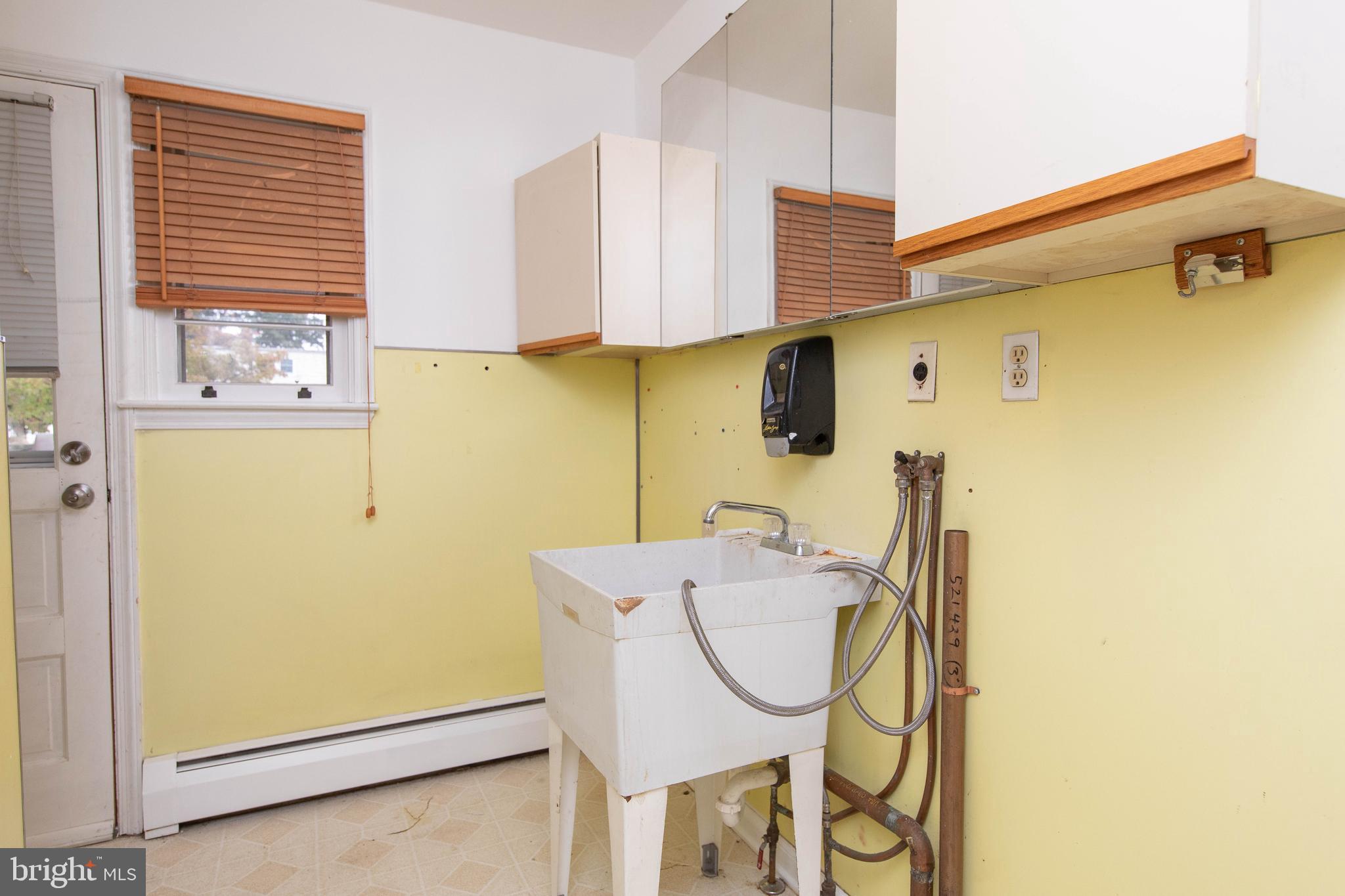95 Radburn Road Huntingdon Valley, PA 19006 - Photo 33 of 40 a utility room with a sink