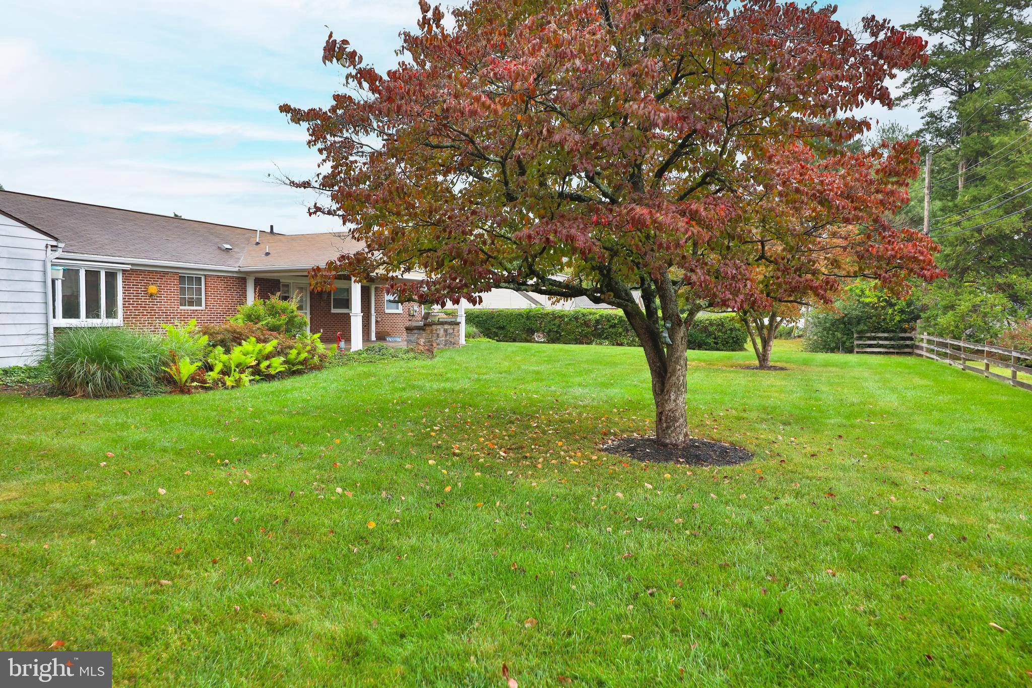 95 Radburn Road Huntingdon Valley, PA 19006 - Photo 37 of 40 a front view of a house with garden