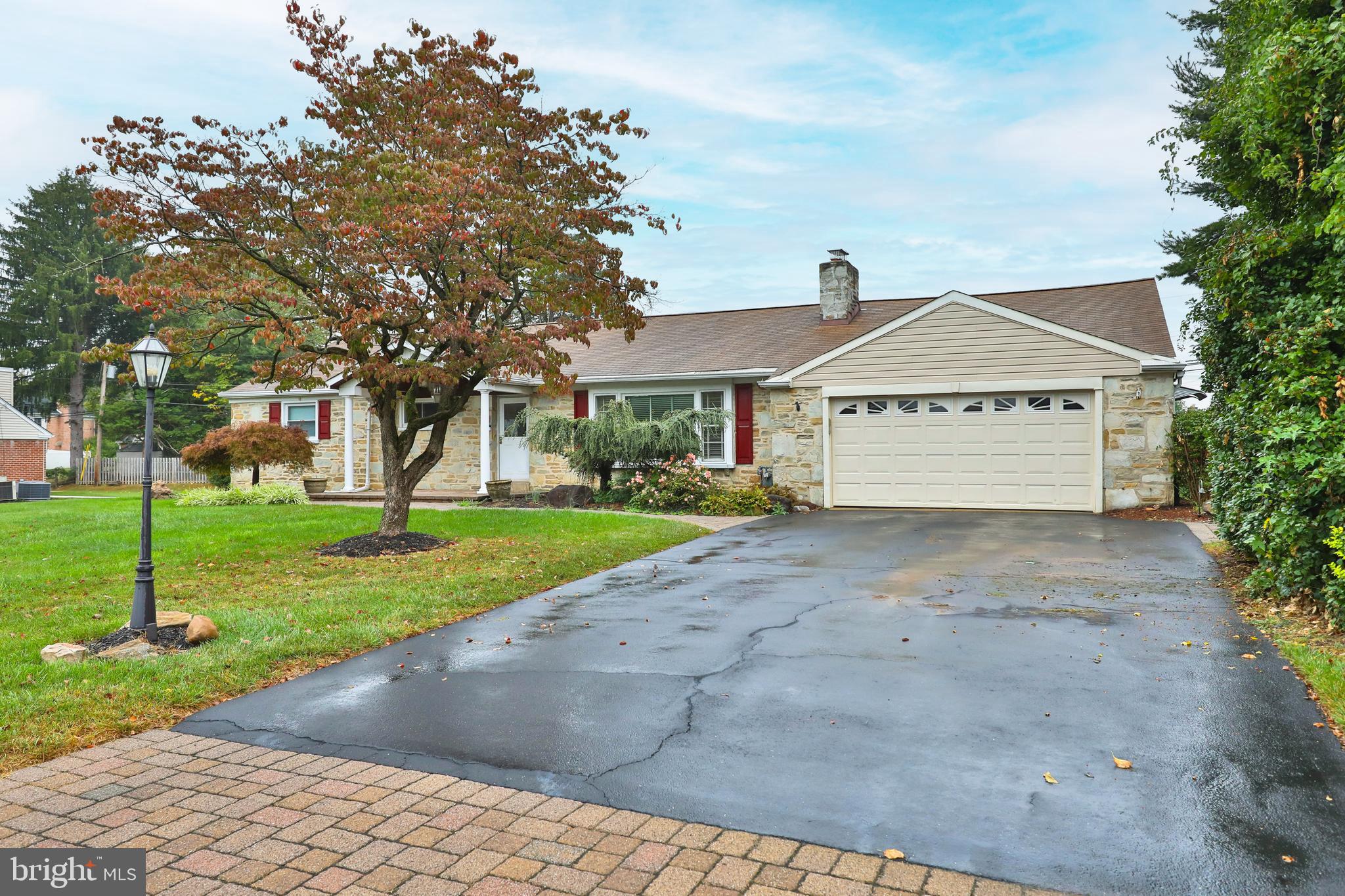 95 Radburn Road Huntingdon Valley, PA 19006 - Photo 40 of 40 a front view of a house with a yard