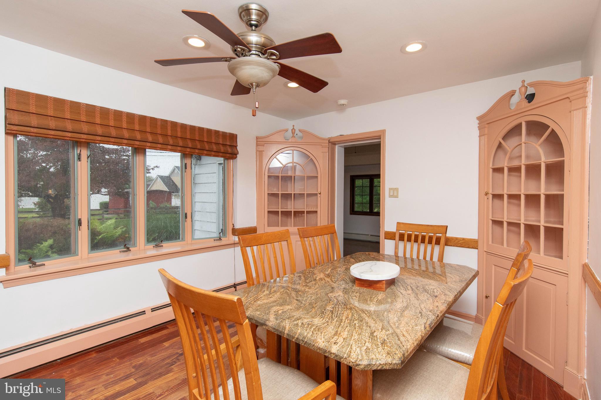 95 Radburn Road Huntingdon Valley, PA 19006 - Photo 6 of 40 a view of a dining room with furniture window and outside view