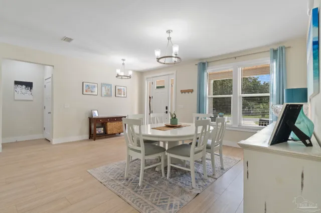 a view of a dining room with furniture