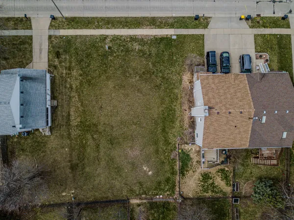 an aerial view of residential house with outdoor space