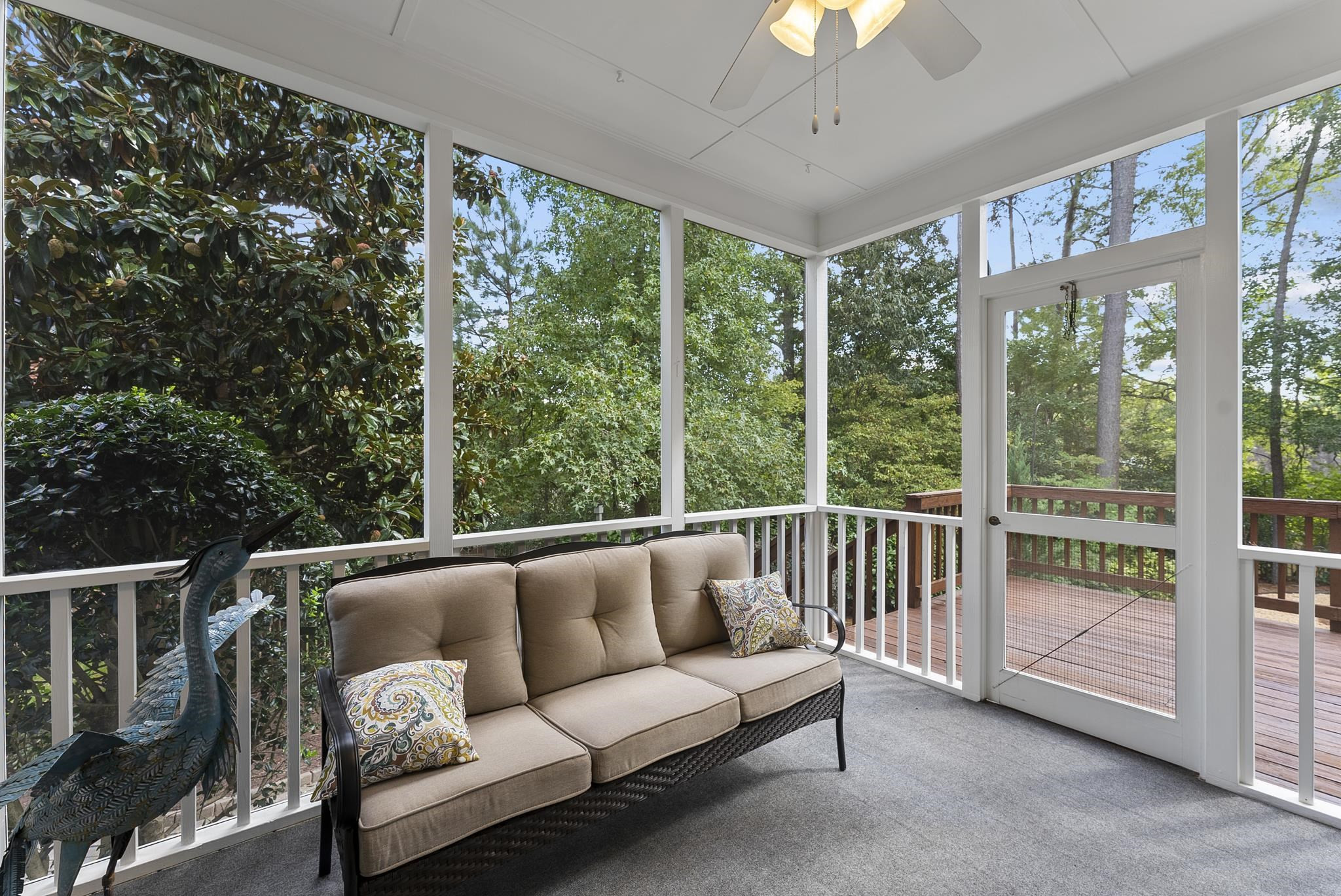1608 Falls River Avenue Raleigh, NC 27614 - Photo 11 of 65 a living room with furniture and a large window
