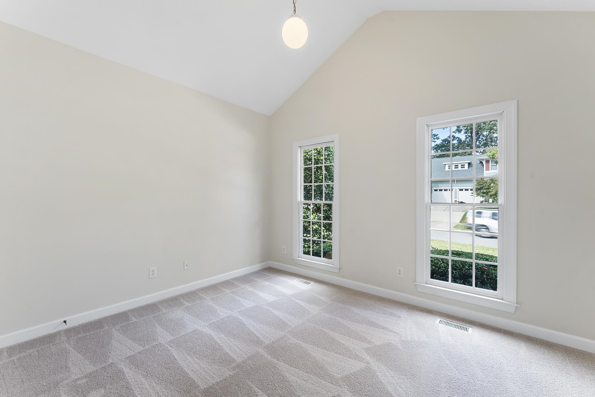 1608 Falls River Avenue Raleigh, NC 27614 - Photo 24 of 65 an empty room with windows