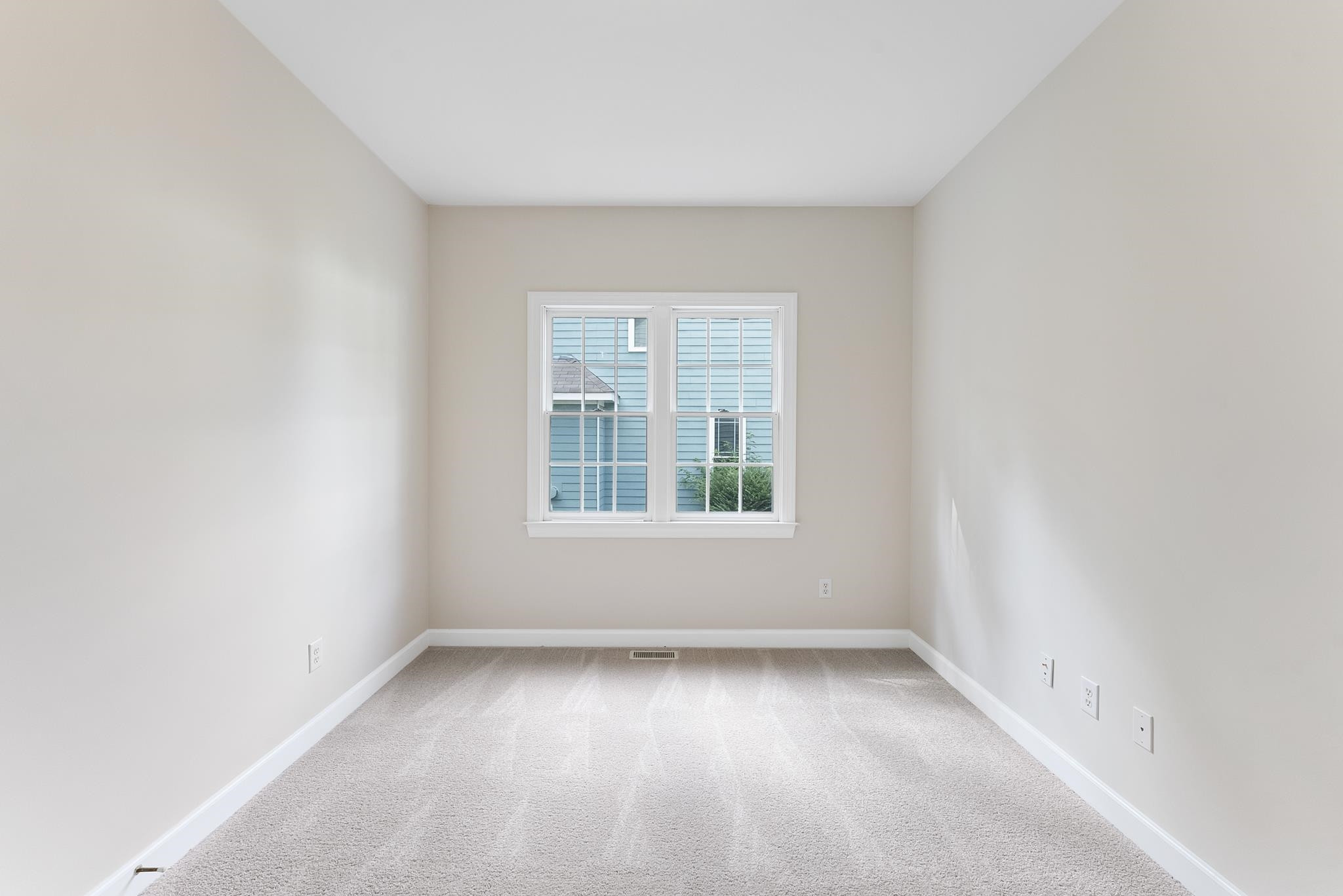 1608 Falls River Avenue Raleigh, NC 27614 - Photo 28 of 65 an empty room with a window