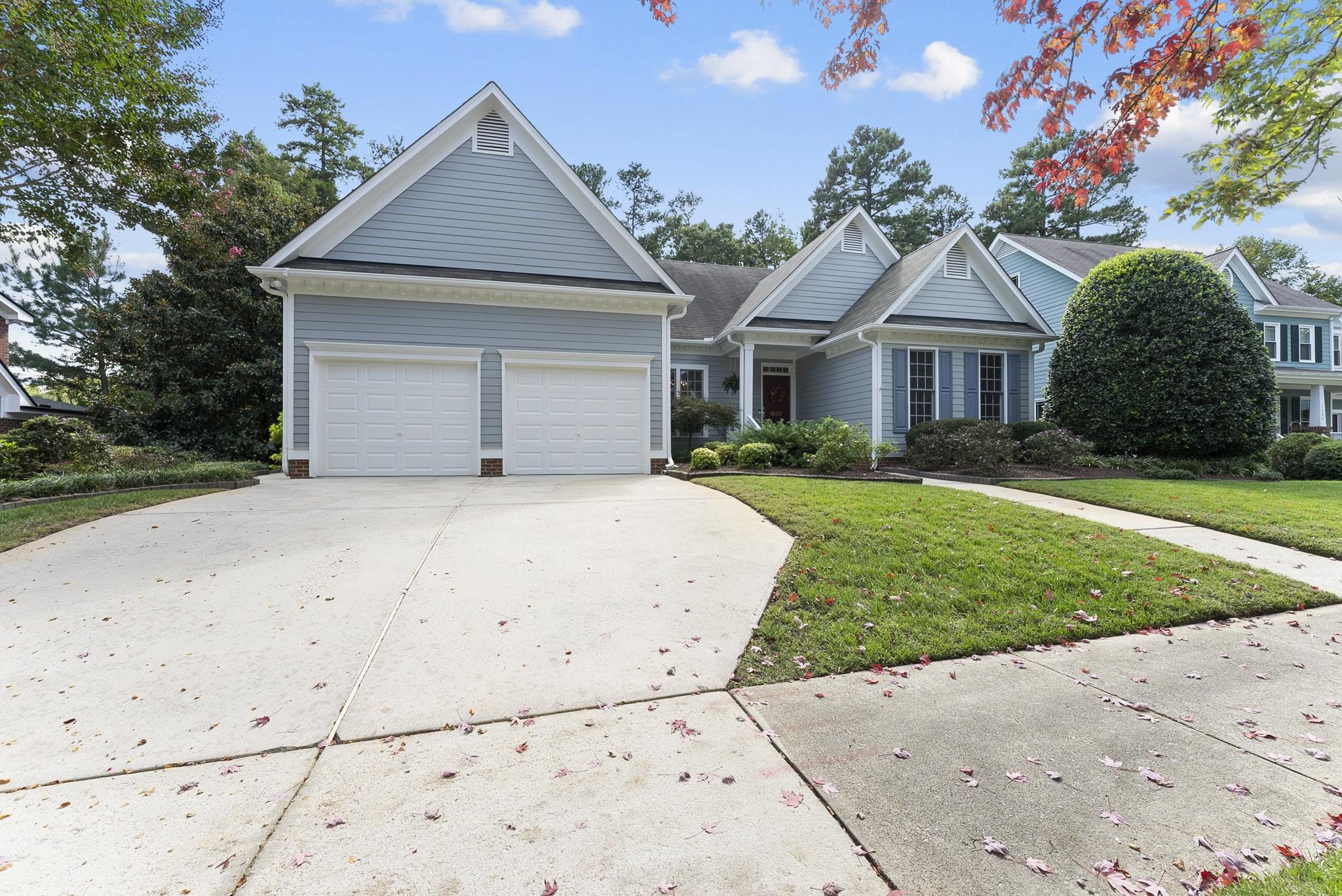 1608 Falls River Avenue Raleigh, NC 27614 - Photo 50 of 65 a front view of a house with a yard