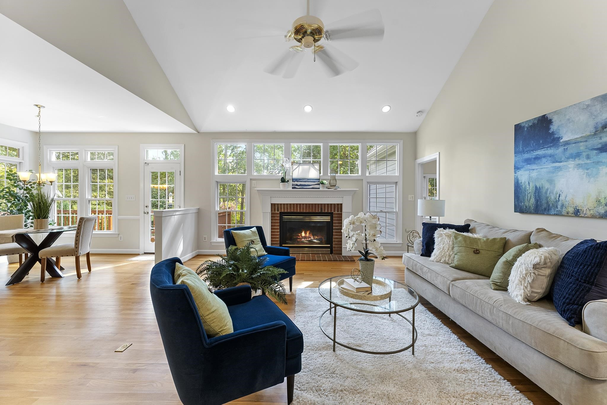 1608 Falls River Avenue Raleigh, NC 27614 - Photo 5 of 65 a living room with furniture and a fireplace