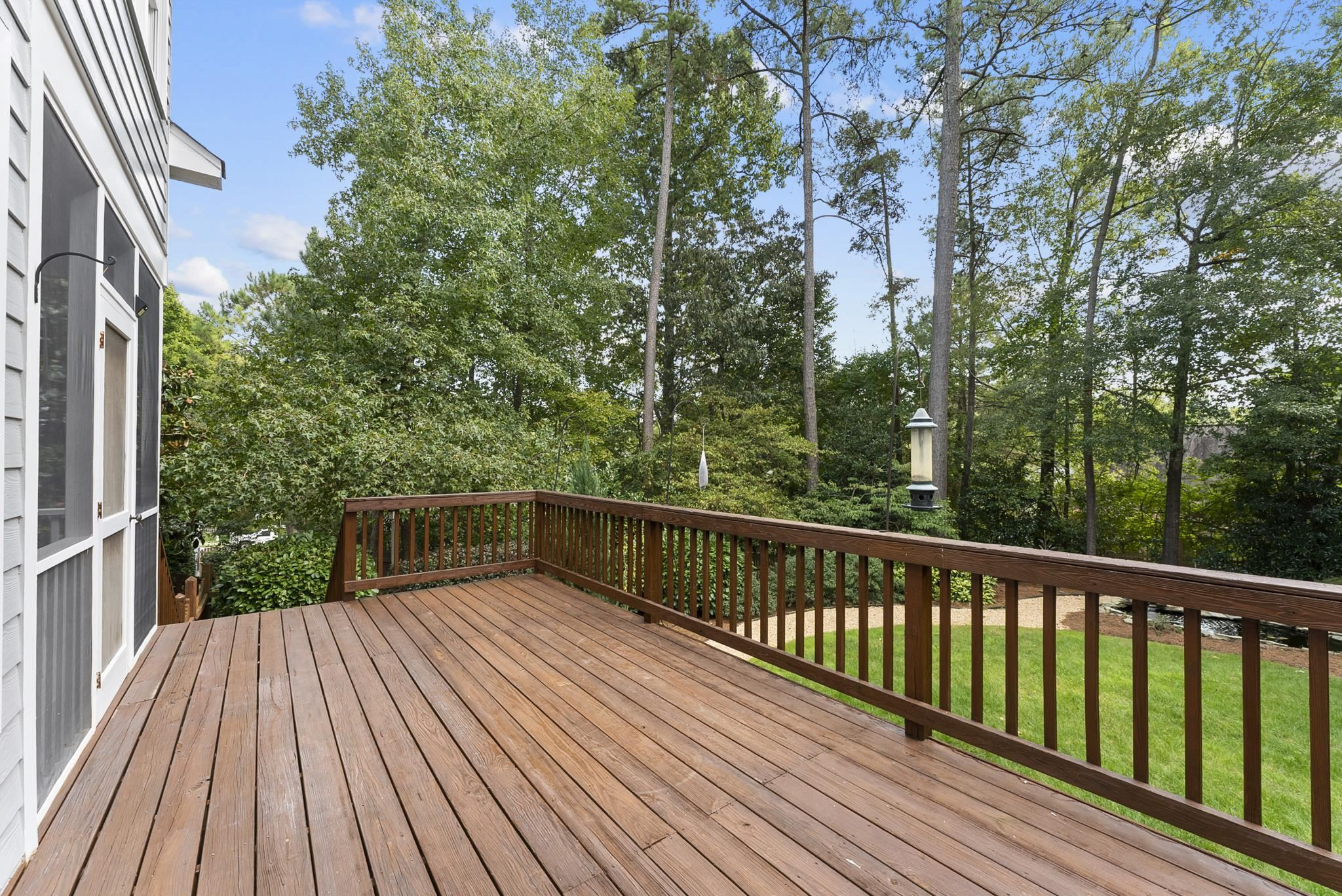 1608 Falls River Avenue Raleigh, NC 27614 - Photo 51 of 65 a view of balcony with wooden floor and fence