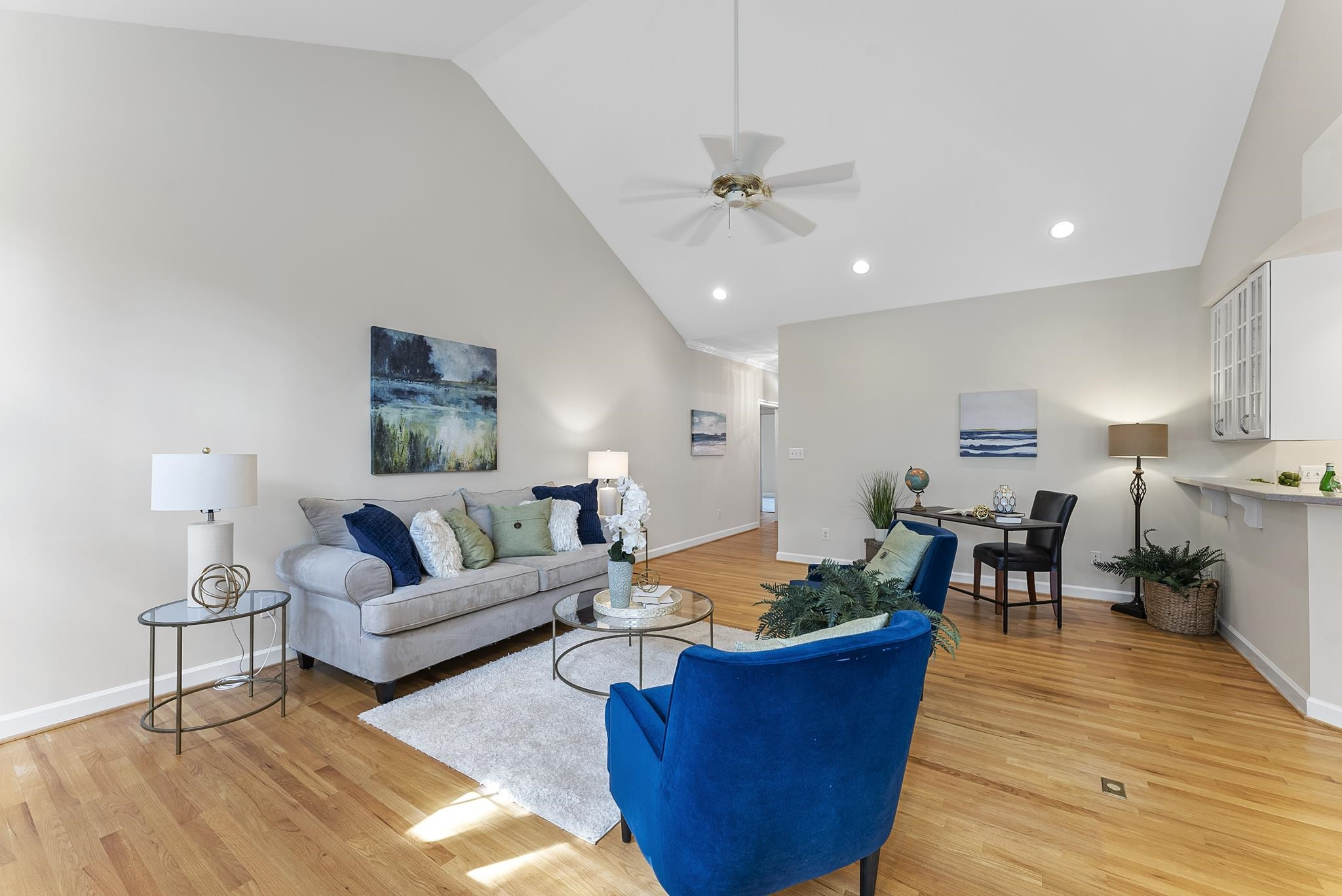 1608 Falls River Avenue Raleigh, NC 27614 - Photo 6 of 65 a living room with furniture wooden floor and a chandelier