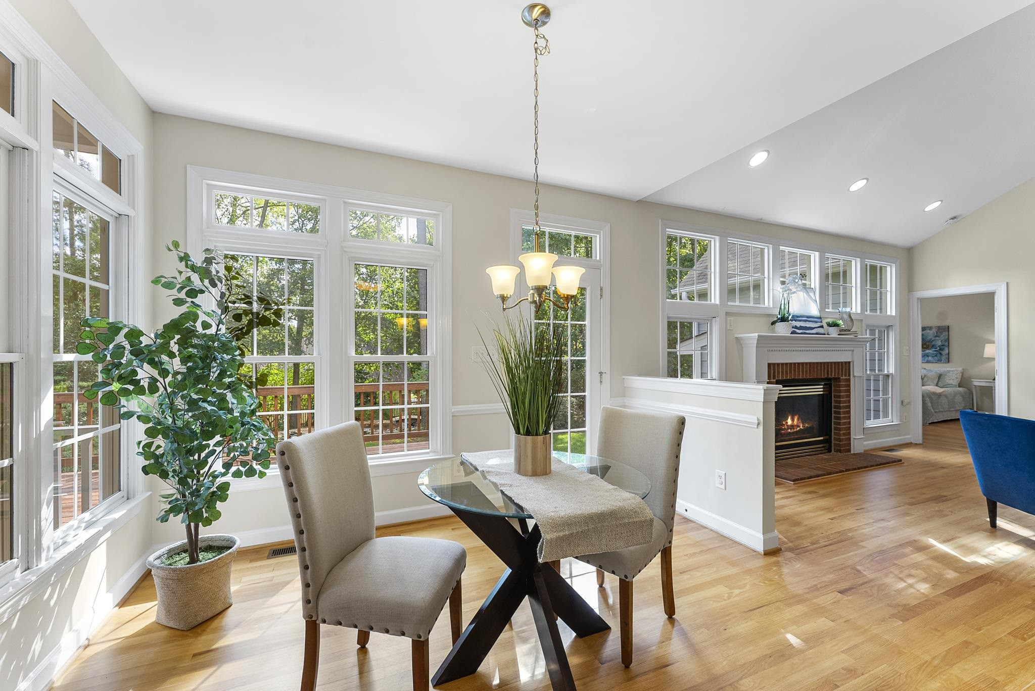 1608 Falls River Avenue Raleigh, NC 27614 - Photo 8 of 65 a view of a dining room with furniture window and wooden floor