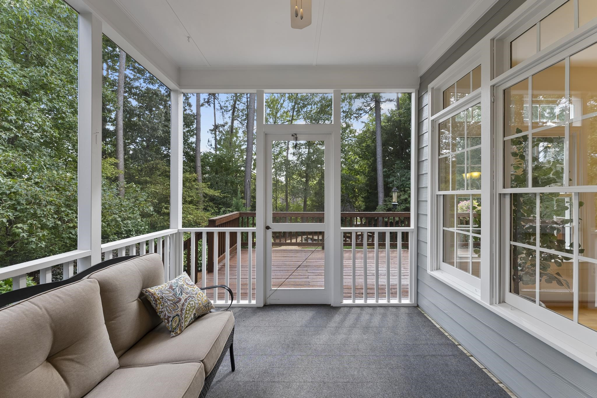 1608 Falls River Avenue Raleigh, NC 27614 - Photo 10 of 65 a balcony with furniture and garden view