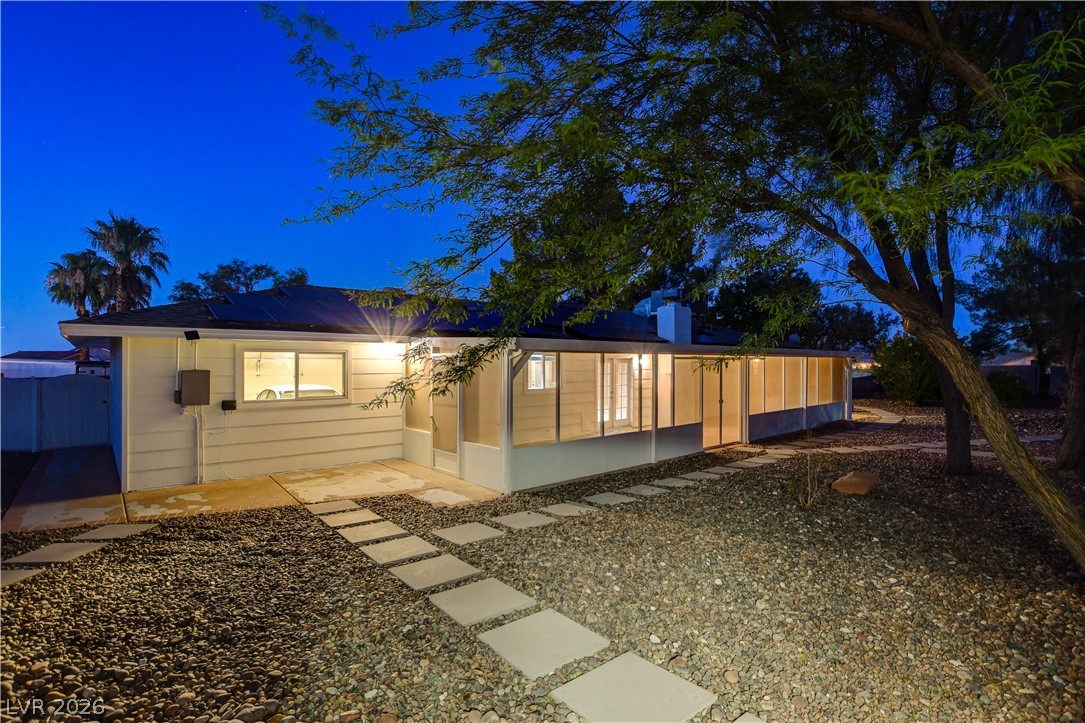 7631 Bermuda Road Las Vegas, NV 89123 - Photo 59 of 64 A private, enclosed sunroom extends from this charming residence, perfect for quiet evenings.