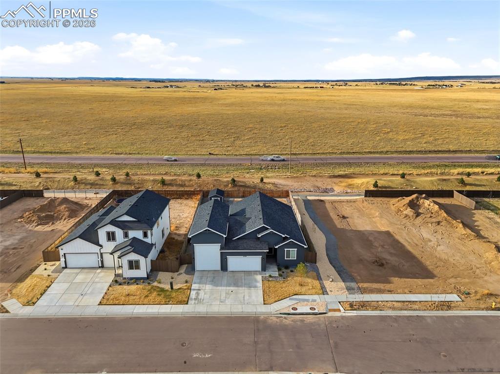 22180 Cattlemen Run Calhan, CO 80808 - Photo 50 of 50 an aerial view of residential houses with outdoor space