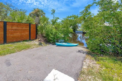 a view of a pathway with a bench