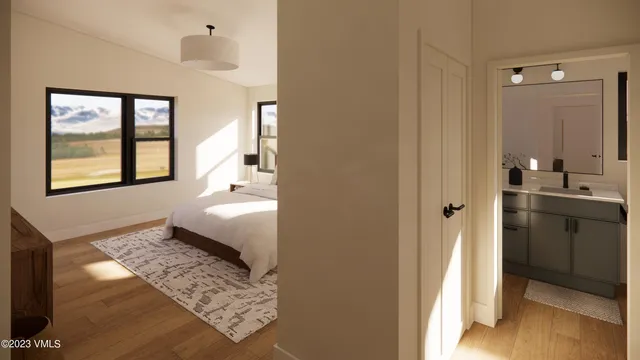 a spacious bathroom with a granite countertop sink and a window