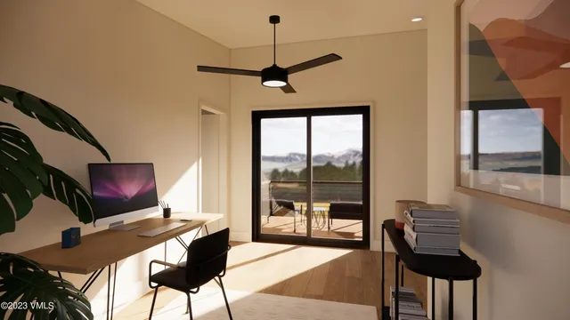 a view of a livingroom with furniture and a window