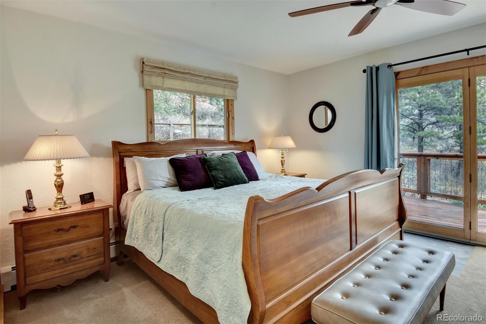 6761 Olde Stage Road Boulder, CO 80302 - Photo 16 of 36 a bedroom with a bed and a window