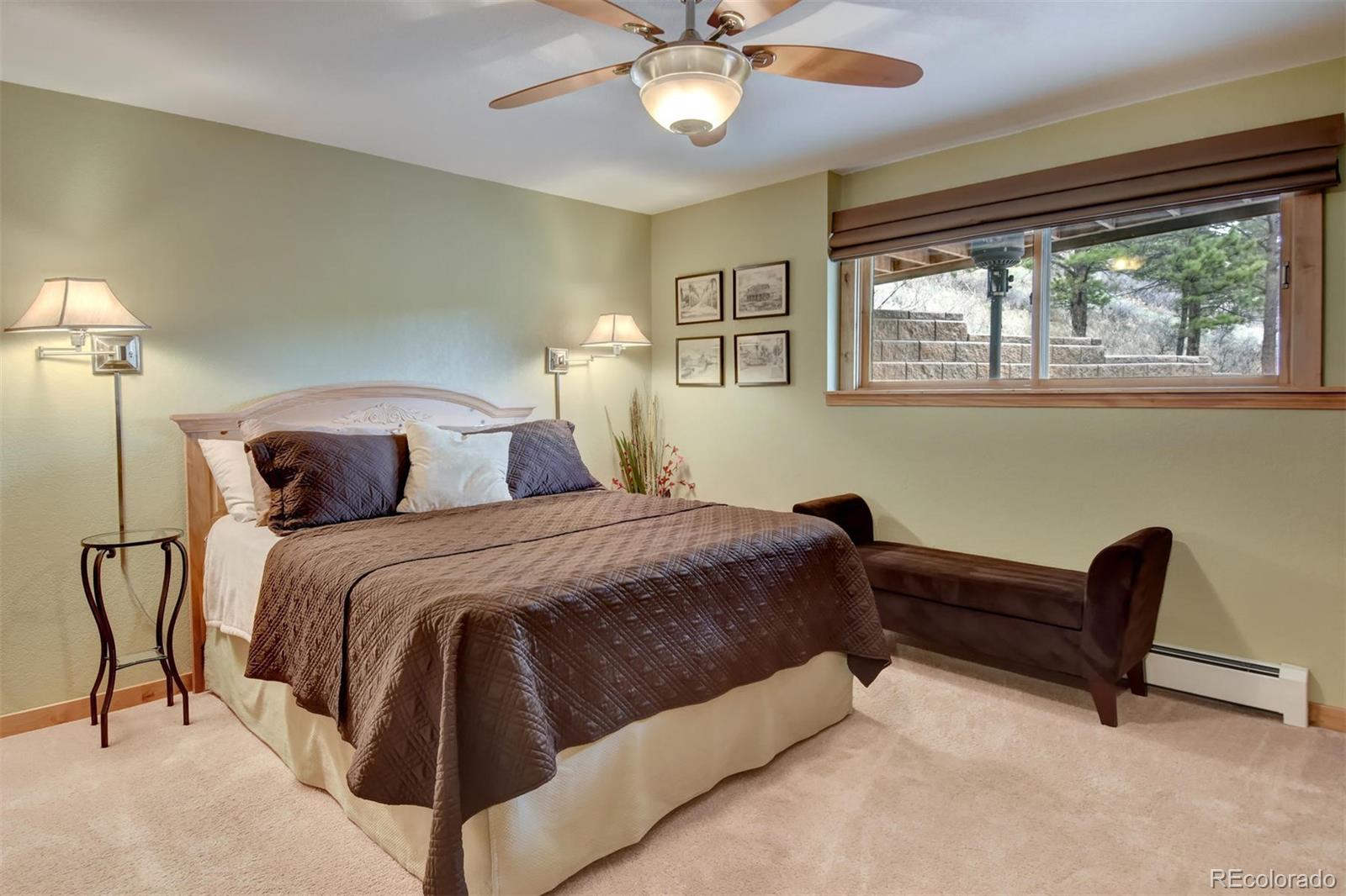 6761 Olde Stage Road Boulder, CO 80302 - Photo 28 of 36 a bedroom with a bed and window