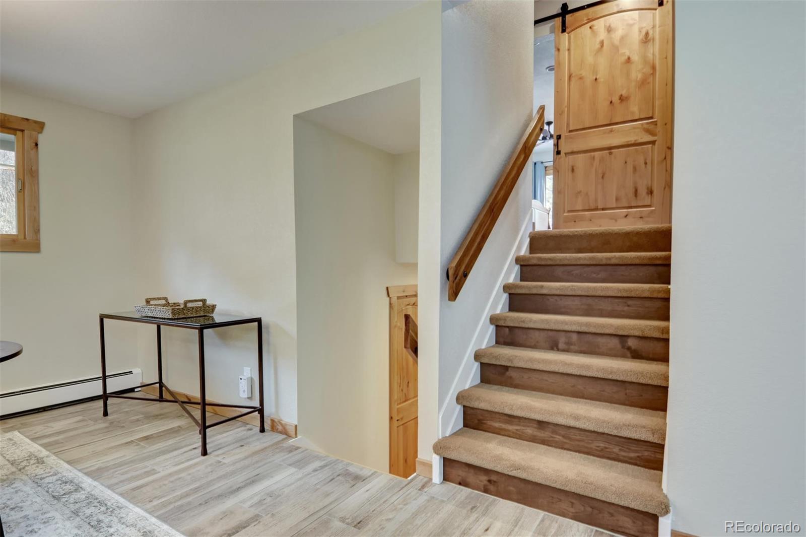 6761 Olde Stage Road Boulder, CO 80302 - Photo 9 of 36 a view of entryway with wooden floor