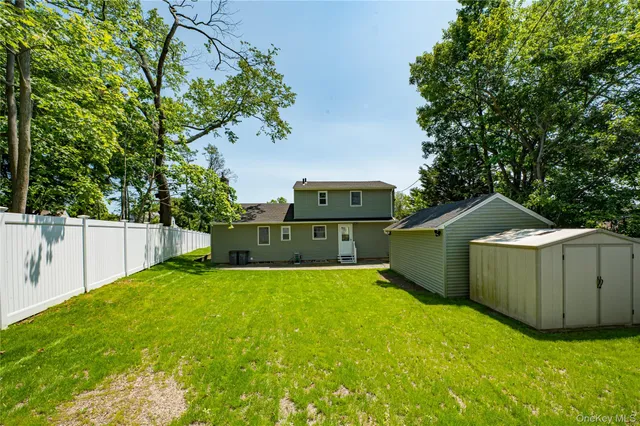 a view of a backyard with a house
