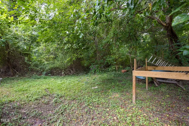 a garden view with a seating space